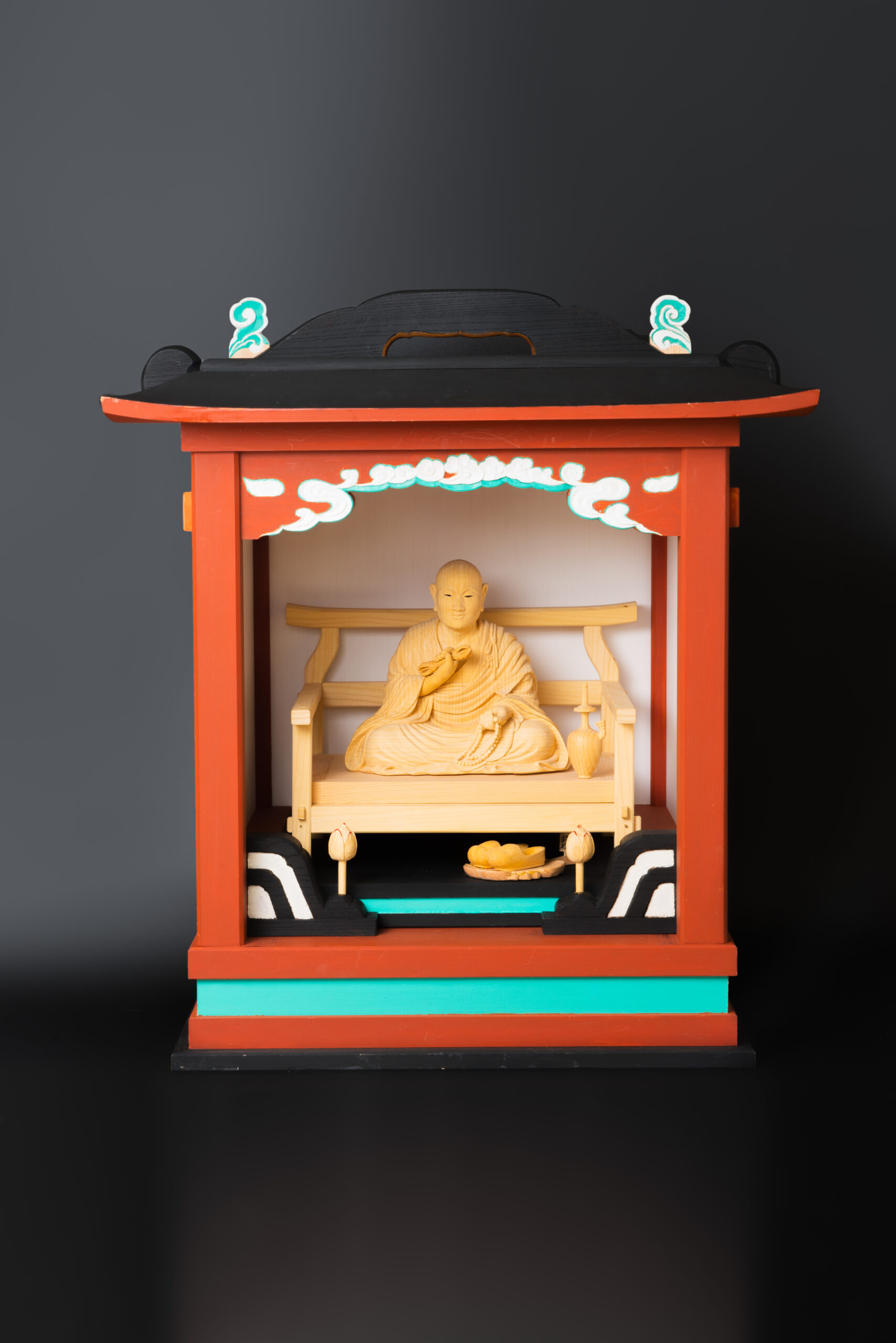 mobile shrine and wooden statue of Kobo Daishi_